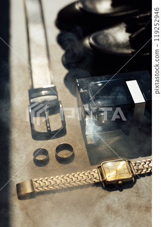 Groom's accessories for a wedding. Smoke adds authenticity to a photo 119252946