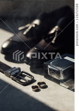 Grooms accessories for wedding, rings, shoes in smoke. Wedding day 119253388