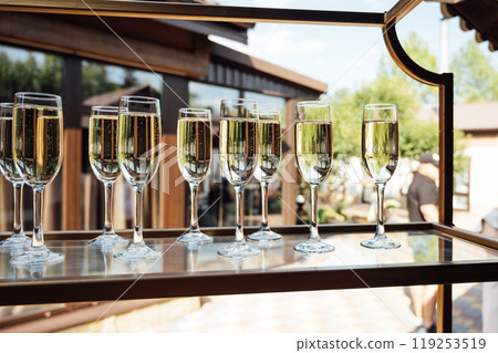 Glasses of champagne at the Banquet, white sparkling wine in wine glasses, festive mood 119253519