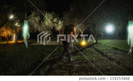 Zombie Woman Dances In An Enchanted Halloween Forest At Night Zombie Woman Dances In An Enchanted Halloween Forest At Night 119253866