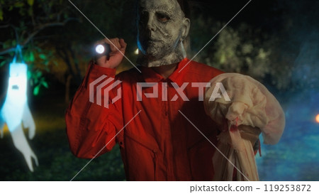 Monster Searches For His Victims With Flashlight On Halloween Night With Torch Monster Searches For His Victims With Flashlight On Halloween Night With Torch 119253872