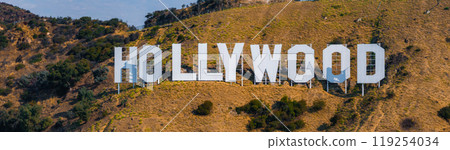 The Hollywood Sign is displayed on the dry, grassy hills of Mount Lee, surrounded by scattered shrubs in the Hollywood district of Los Angeles. The Hollywood Sign is displayed on the dry, grassy hills of Mount Lee, surrounded by scattered shrubs in the Hollywood district of Los Angeles. 119254034