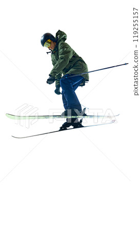 Airborne shot, with the skier maintaining form against white background, highlighting strength and control necessary for high-altitude stunts. 119255157