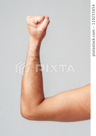 A person hand gesture against a neutral background 119255854