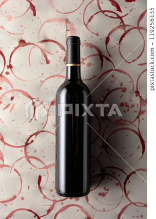 Bottle of red wine. 119256135