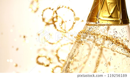Festive celebration with champagne bottle and golden glitter for holiday design 119256189