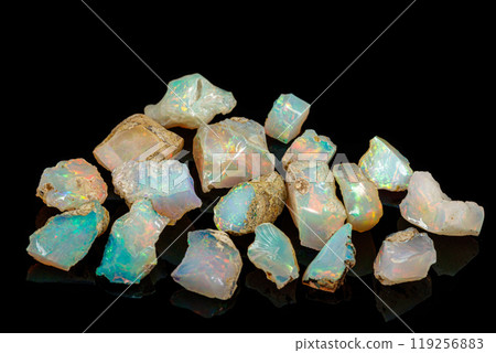 macro mineral stone rare and beautiful opals on a black background macro mineral stone rare and beautiful opals on a black background 119256883