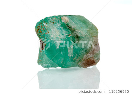 macro mineral stone emerald on a white background macro mineral stone emerald on a white background 119256920