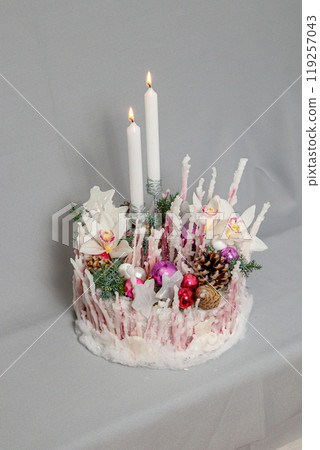 Christmas composition of flowers and Christmas decorations 119257043