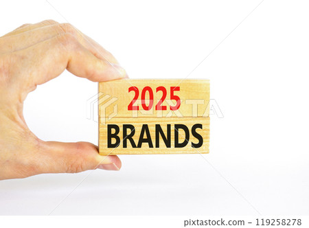 Planning 2025 brands new year symbol. Concept words 2025 Brands on beautiful wooden blocks. Beautiful white background. Businessman hand. Business 2025 brands new year concept. Copy space. 119258278