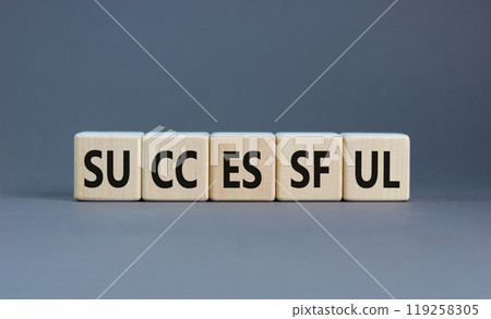 Successful symbol. Concept word Successful on beautiful wooden blocks. Beautiful grey background. Business successful concept. Copy space. 119258305