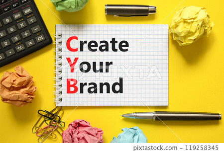 CYB Create your brand symbol. Concept words CYB Create your brand on beautiful white note. Beautiful yellow background. Black calculator. Business CYB Create your brand concept. Copy space. 119258345