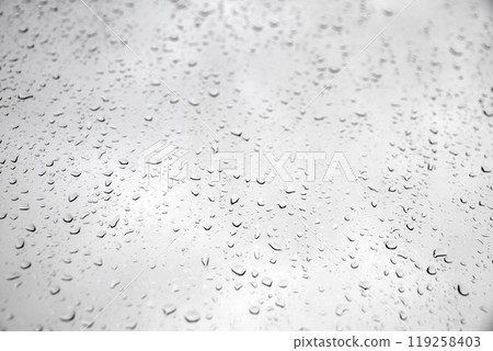 Rain drops on a window 119258403
