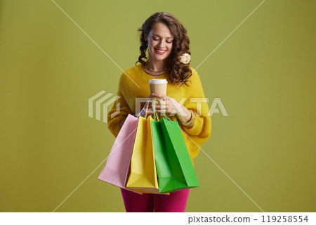 happy healthy woman isolated on green background happy healthy woman isolated on green background 119258554