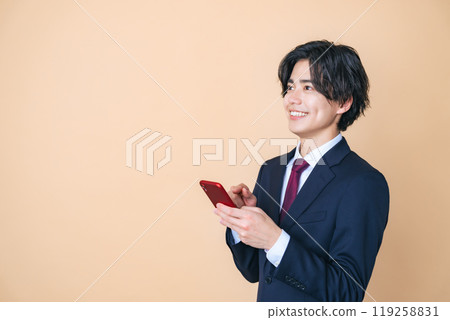 young businessman using smartphone young businessman using smartphone 119258831