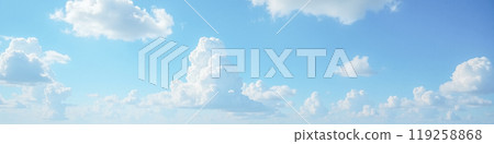 Expansive blue sky with soft white cumulus clouds scattered across, tranquil daylight scene for calm mood setting in creative projects, natural atmospheric environment for graphic element Expansive blue sky with soft white cumulus clouds scattered across, tranquil daylight scene for calm mood setting in creative projects, natural atmospheric environment for graphic element 119258868