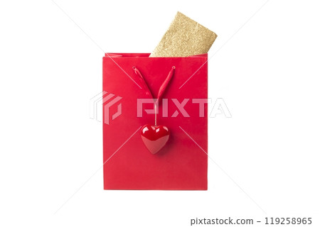 Beautiful red surprise present bag with heart and golden card. Wonderful gift with envelope inside, maybe a voucher or concert tickets for Valentine's Day or Mother's Day. Isolated white background 119258965