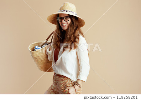 smiling elegant woman in blouse and shorts 119259201