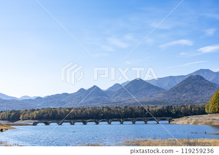 Taushubetsu River Bridge on the former Shihoro Line of the Japanese National Railways on a clear autumn day in Kamishihoro, Hokkaido 119259236