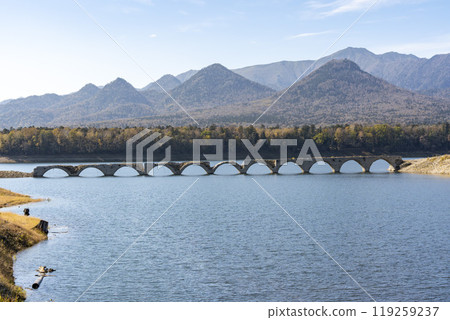Taushubetsu River Bridge on the former Shihoro Line of the Japanese National Railways on a clear autumn day in Kamishihoro, Hokkaido 119259237