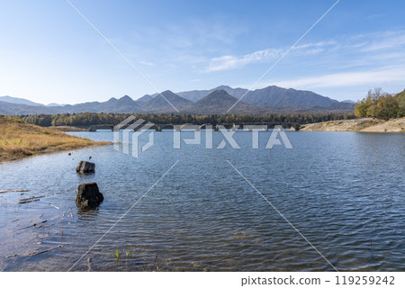 Taushubetsu River Bridge on the former Shihoro Line of the Japanese National Railways on a clear autumn day in Kamishihoro, Hokkaido Taushubetsu River Bridge on the former Shihoro Line of the Japanese National Railways on a clear autumn day in Kamishihoro, Hokkaido 119259242