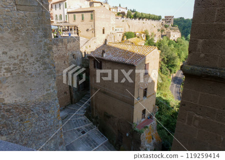 Pitigliano is a striking medieval town built into the cliffs of Tuscany. 119259414