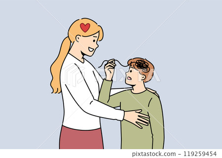 Motherly support from caring woman hugging unhappy boy with confused thoughts in head 119259454