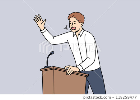 Fiery politician shouts into microphone, standing behind podium and expressing far-right ideas 119259477