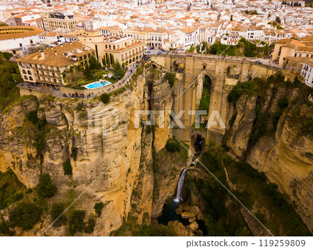 Rocky landscape of Ronda city with Puente Nuevo Bridge and buildings Rocky landscape of Ronda city with Puente Nuevo Bridge and buildings 119259809