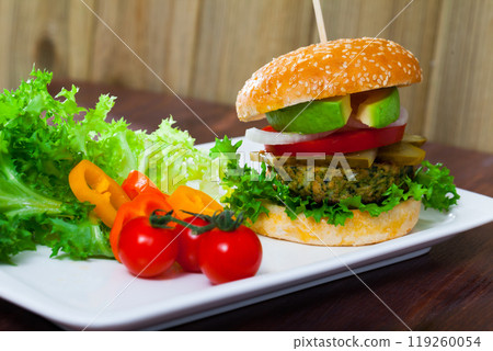 Vegan burger with greens Vegan burger with greens 119260054