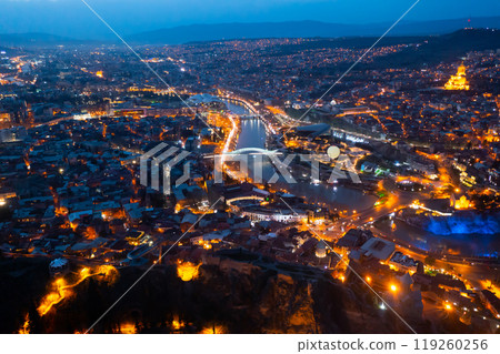 Night aerial view of Tbilisi city with Kura river Night aerial view of Tbilisi city with Kura river 119260256