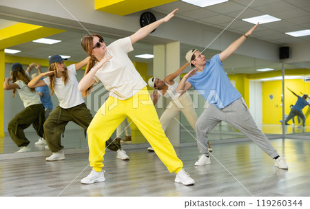 Teen girl dancing modern dances in dance studio 119260344