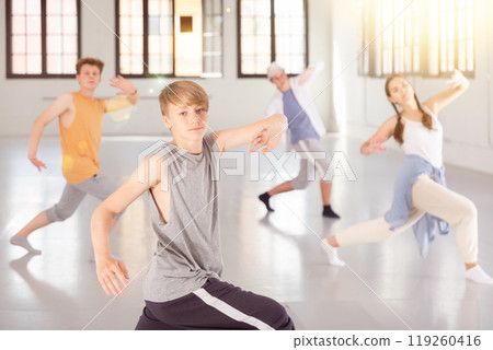 Boy training hip hop at group class 119260416