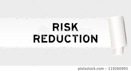 Ripped gray paper background that have word risk reduction under torn part 119260993