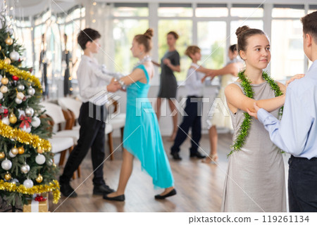 Boy and girl dancing waltz in studio 119261134