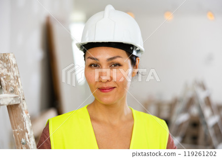 Portrait of smiling asian woman engineer 119261202