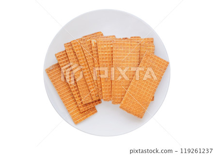 Waffles with chocolate coating. Group of waffles in ceramic plate. Belgian dessert. Isolate on a white background. Top view. Waffles with chocolate coating. Group of waffles in ceramic plate. Belgian dessert. Isolate on a white background. Top view. 119261237
