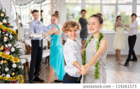 Boy and girl dancing waltz in studio Boy and girl dancing waltz in studio 119261573