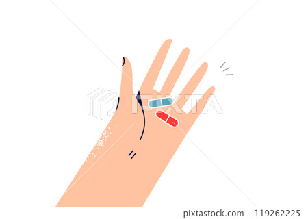 Hand with two pills to fight headache or vitamins to improve immunity after illness 119262225