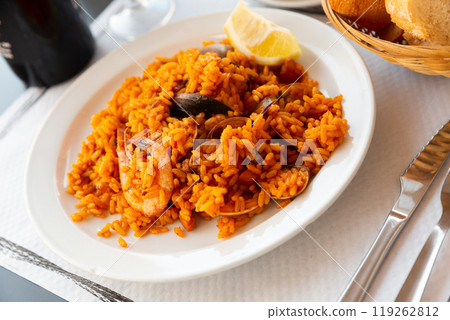 Paella on white plate Paella on white plate 119262812