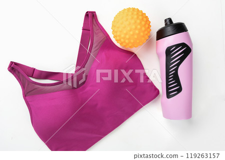 Concept of sports lifestyle. Flat lay of sports top bra and drinking bottle for water. 119263157