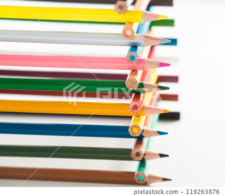 Pencils stacked in log house 119263876
