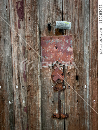 Old wooden house door, France 119265051