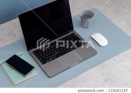 Stylish desk with laptop Stylish desk with laptop 119265187
