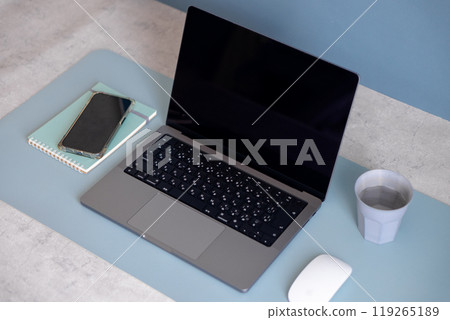 Stylish desk with laptop Stylish desk with laptop 119265189