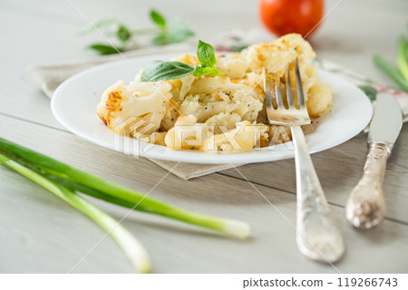 Diet boiled cauliflower fried in oil with spices 119266743