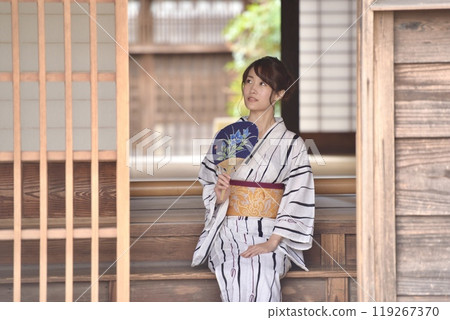 A young woman in a yukata 119267370