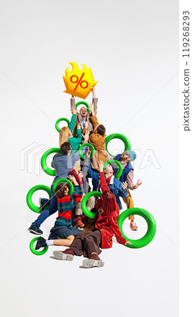 Man triumphantly holding up giant percentage symbol, as others below him reach up in awe, symbolizing fight for best Black Friday discounts. Creative colorful collage. 119268293