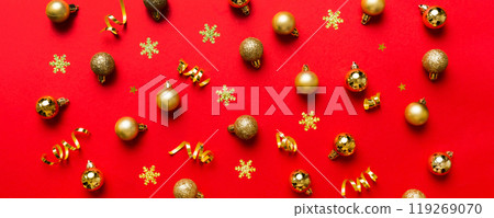 Christmas composition. a pattern of christmas balls on colored background. Flat lay, top view New year decor Christmas composition. a pattern of christmas balls on colored background. Flat lay, top view New year decor 119269070
