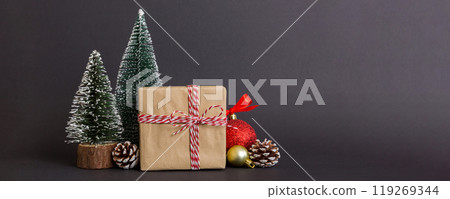 Christmas composition. Gifts, small tree, branches and craft DIY decorations on white background. New year concept. Christmas home decoration Flat lay, top view, copy space 119269344